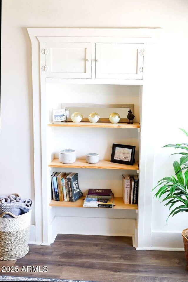 interior details featuring wood finished floors