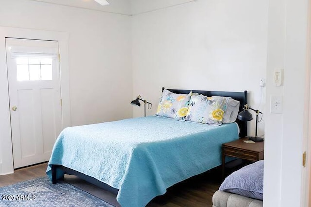 bedroom with wood finished floors