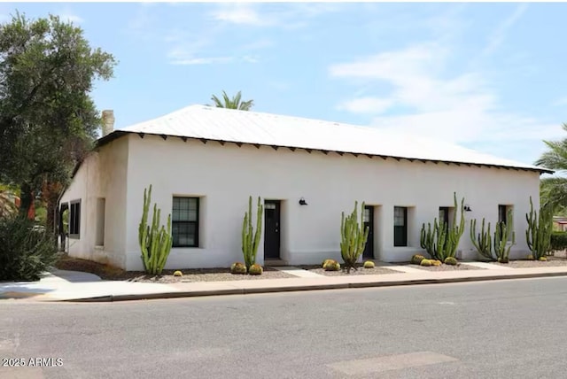 view of front of home with stucco siding