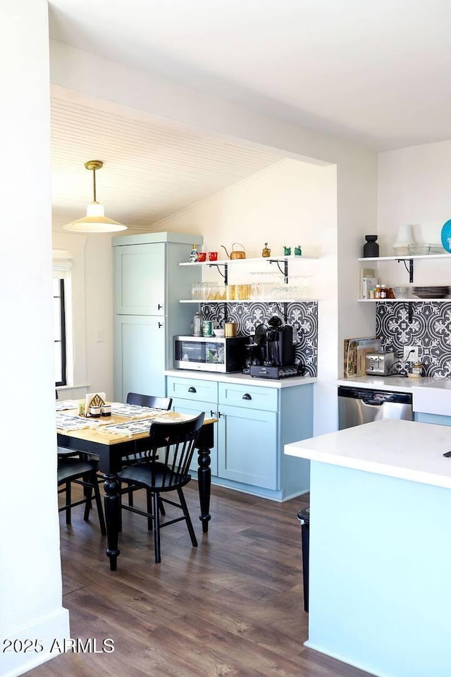 kitchen with open shelves, appliances with stainless steel finishes, dark wood-type flooring, and tasteful backsplash