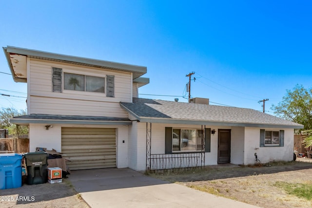 9408 N 15th St, Phoenix, AZ 85020 - view of front of property with a porch, concrete driveway, a garage, and a shingled roof