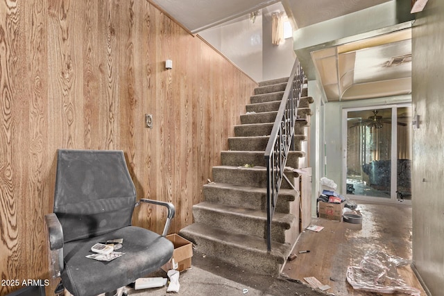9408 N 15th St, Phoenix, AZ 85020 - stairway featuring wooden walls and a ceiling fan