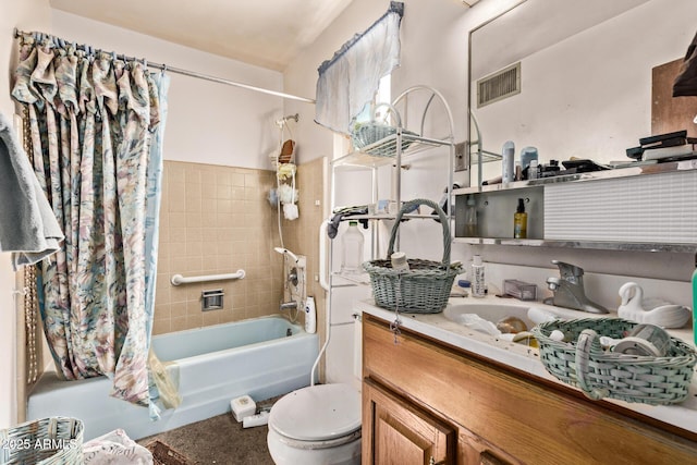 9408 N 15th St, Phoenix, AZ 85020 - full bathroom with shower / bath combo with shower curtain, vanity, and toilet