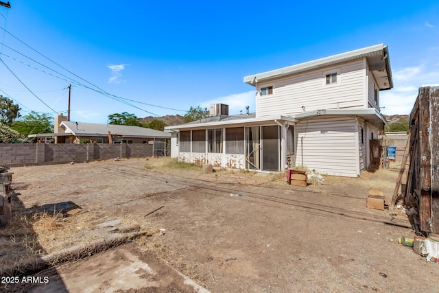 9408 N 15th St, Phoenix, AZ 85020 - back of house featuring a sunroom and cooling unit
