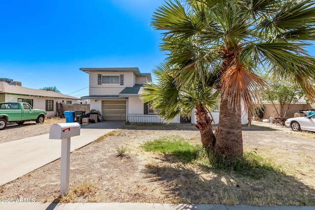 9408 N 15th St, Phoenix, AZ 85020 - view of front facade with concrete driveway and an attached garage