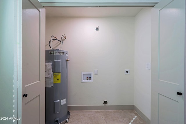 laundry area featuring electric water heater, light tile patterned floors, washer hookup, and hookup for an electric dryer