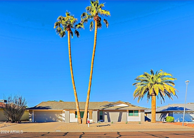 ranch-style home with a garage