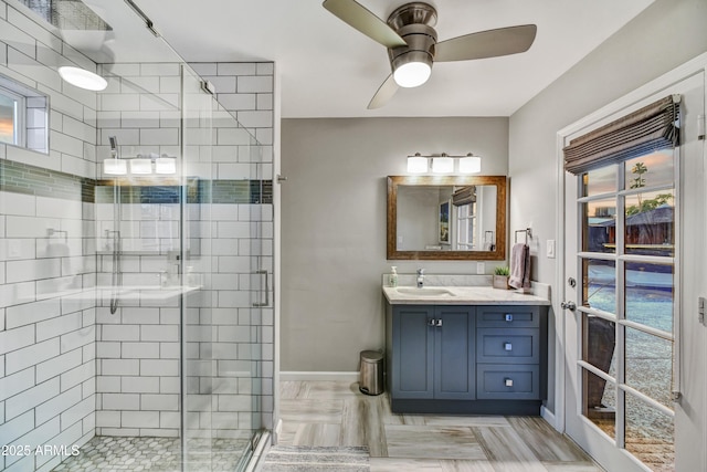 4610 N 14th Ave, Phoenix, AZ 85013 - full bathroom with a stall shower, vanity, and a ceiling fan