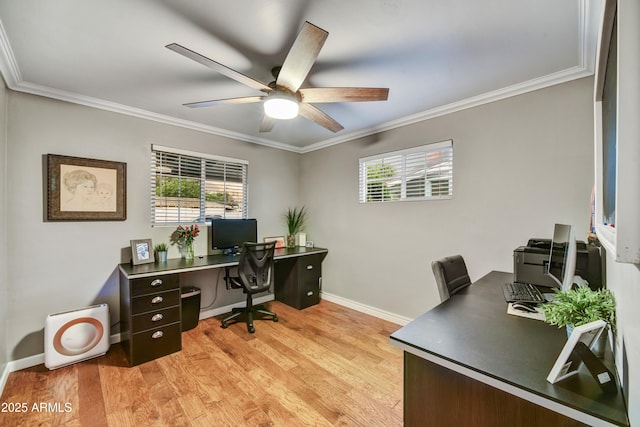 4610 N 14th Ave, Phoenix, AZ 85013 - home office with ornamental molding, healthy amount of natural light, a ceiling fan, and light wood-type flooring