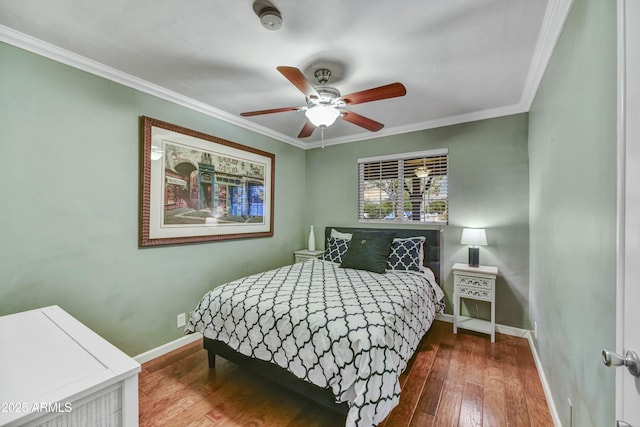 4610 N 14th Ave, Phoenix, AZ 85013 - bedroom featuring hardwood / wood-style floors, ornamental molding, and a ceiling fan