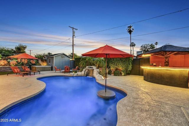 4610 N 14th Ave, Phoenix, AZ 85013 - view of swimming pool with a patio, a fenced backyard, and a shed