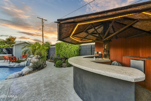 4610 N 14th Ave, Phoenix, AZ 85013 - view of patio featuring an outbuilding