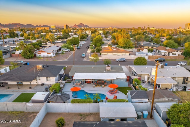 4610 N 14th Ave, Phoenix, AZ 85013 - aerial view at dusk of view of pool area, a residential view, and a mountain view