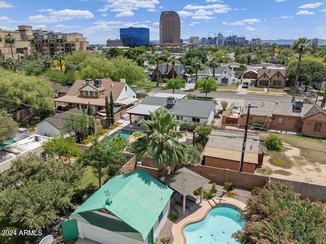 birds eye view of property with a city view