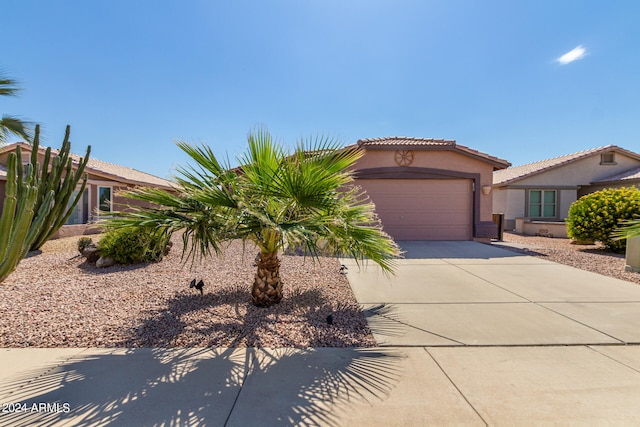 view of front of property with a garage