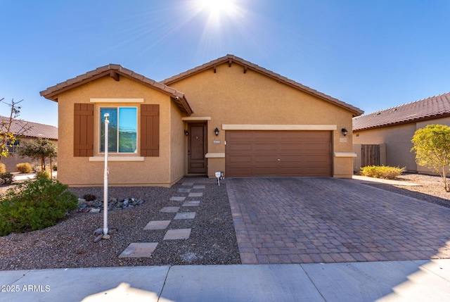 view of front of property featuring a garage