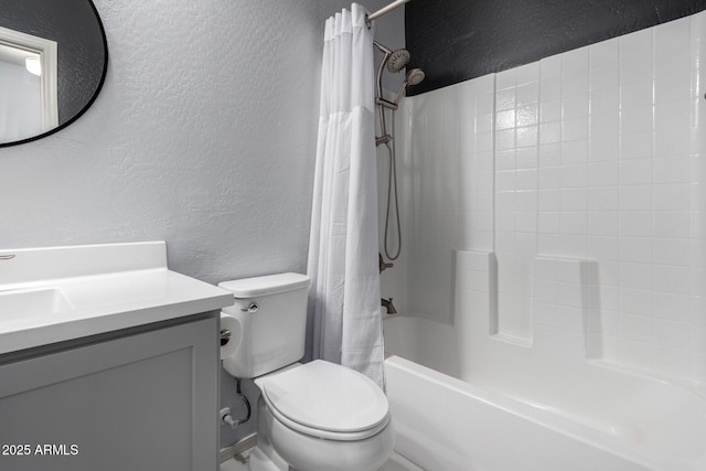 full bathroom with vanity, shower / tub combo with curtain, and toilet