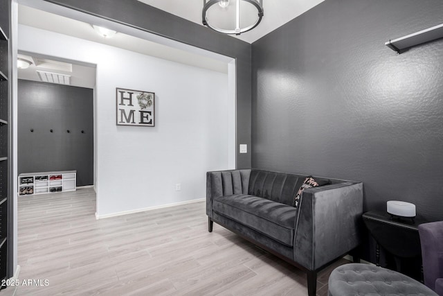 living area with light hardwood / wood-style floors