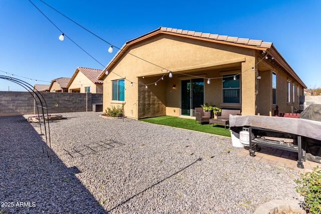 rear view of house with a patio