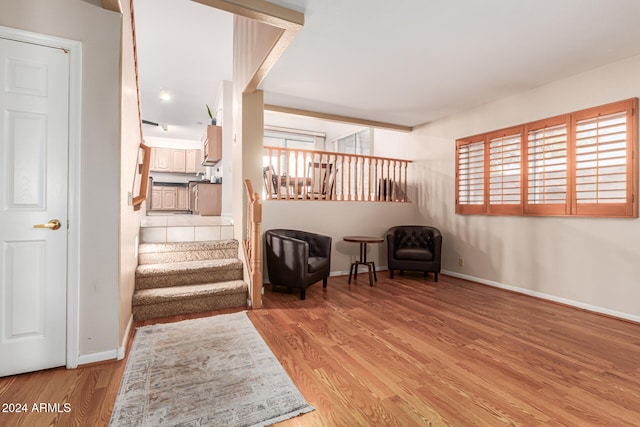 sitting room featuring light hardwood / wood-style floors