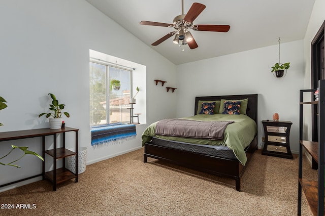 carpeted bedroom featuring ceiling fan and vaulted ceiling