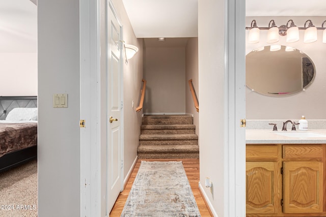 bathroom featuring vanity and hardwood / wood-style floors