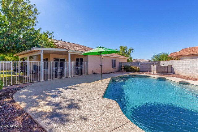 view of pool featuring a patio area