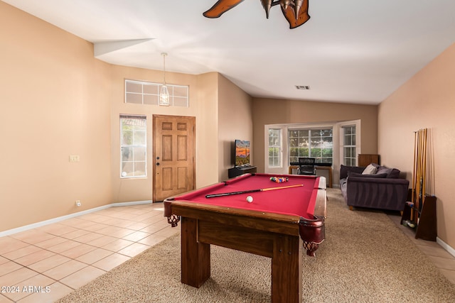 game room featuring pool table, lofted ceiling, and light tile patterned floors