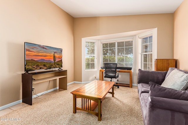 carpeted living room featuring vaulted ceiling