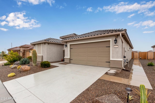 view of front of home with a garage