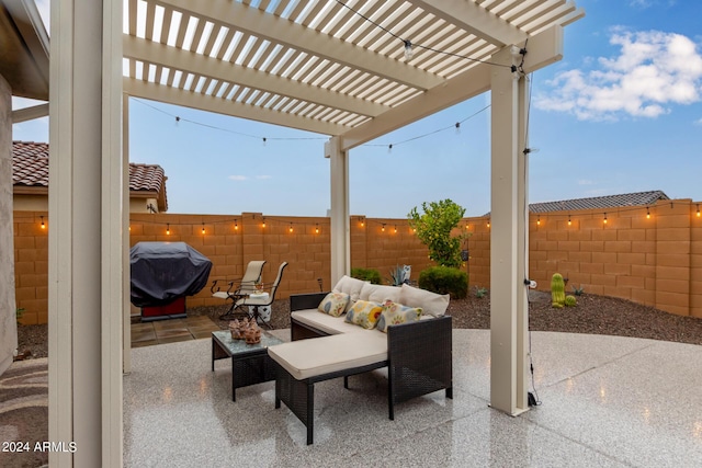 view of patio / terrace with area for grilling and a pergola