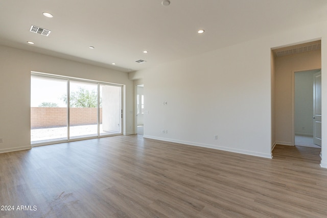 unfurnished room featuring light wood-type flooring