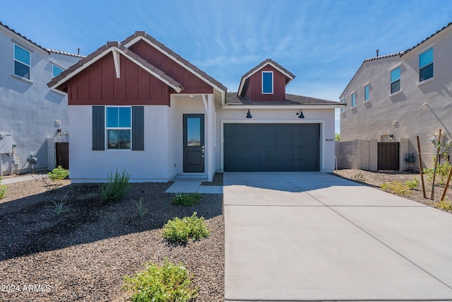 view of front of property with a garage