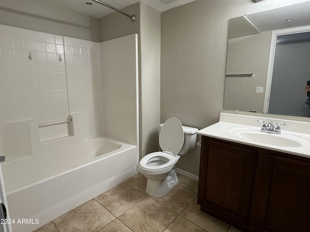 full bathroom with bathing tub / shower combination, tile patterned flooring, vanity, and toilet