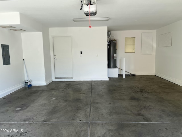 garage with electric panel, water heater, and a garage door opener