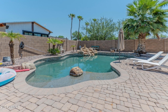 view of pool with a patio area