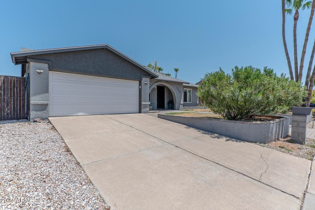 ranch-style house with a garage