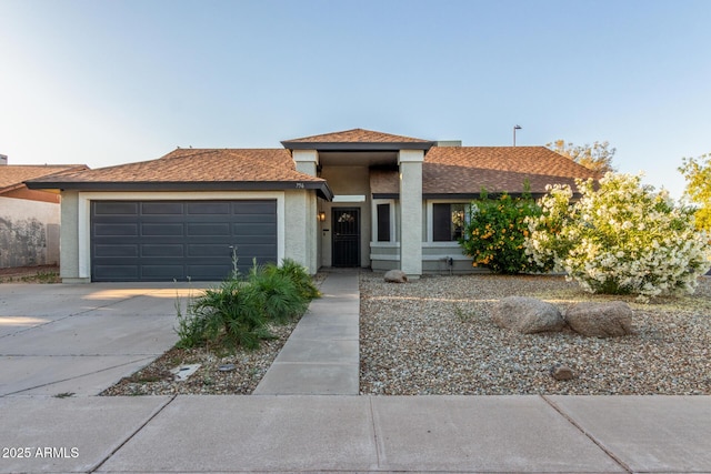 756 E Appaloosa Rd, Gilbert, AZ 85296 - view of front facade featuring an attached garage, concrete driveway, and stucco siding