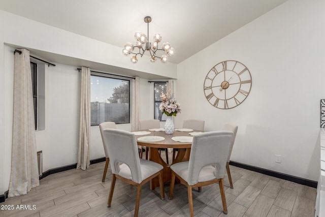 756 E Appaloosa Rd, Gilbert, AZ 85296 - dining room featuring light wood finished floors, a chandelier, and baseboards