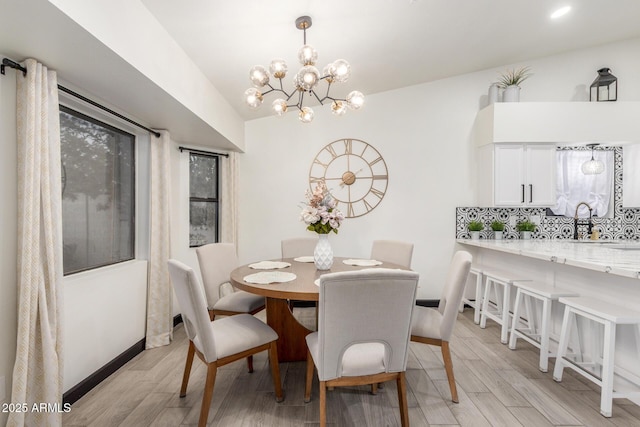 756 E Appaloosa Rd, Gilbert, AZ 85296 - dining room with a chandelier, light wood-style flooring, baseboards, and recessed lighting