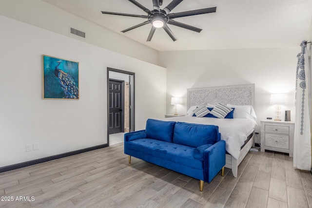 756 E Appaloosa Rd, Gilbert, AZ 85296 - bedroom featuring wood finished floors, vaulted ceiling, baseboards, and a ceiling fan