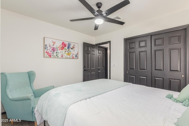 756 E Appaloosa Rd, Gilbert, AZ 85296 - bedroom with wood finished floors, a closet, and a ceiling fan