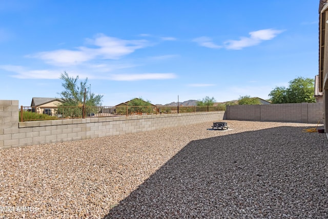 530 W Pintail Dr, Casa Grande, AZ 85122 - fenced backyard featuring an outdoor fire pit