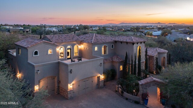 4332 N Santiago Cir, Mesa, AZ 85215 - mediterranean / spanish-style house with driveway, stucco siding, a tiled roof, and an attached garage