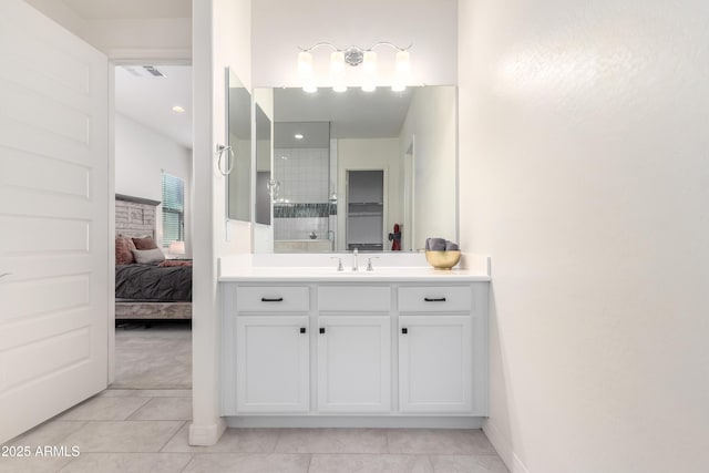 bathroom featuring vanity and tile patterned floors