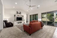 living room with vaulted ceiling and ceiling fan