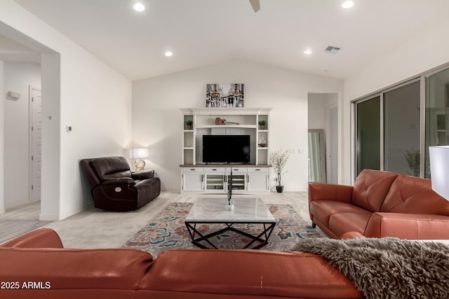 living room featuring light carpet and vaulted ceiling