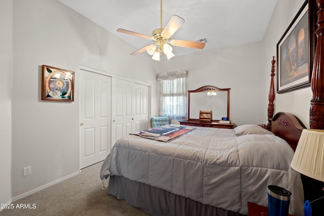 bedroom with a closet, a ceiling fan, visible vents, baseboards, and carpet flooring