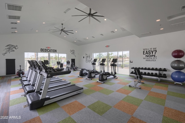 gym featuring ceiling fan and high vaulted ceiling