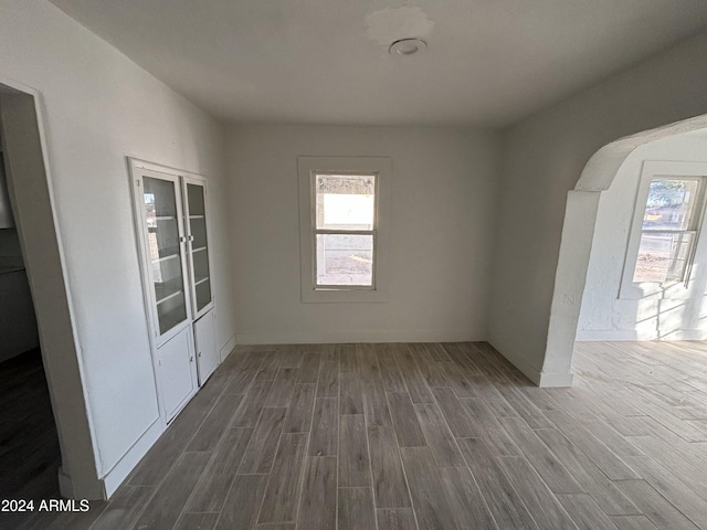 spare room featuring dark hardwood / wood-style floors